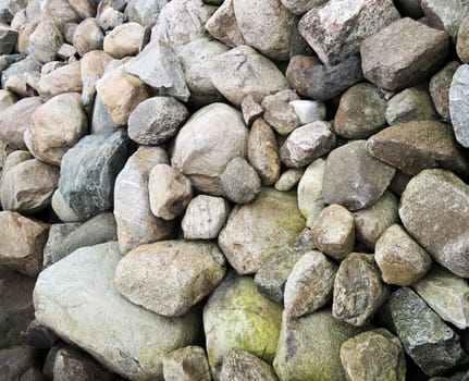 Natural wall of big granite rock stones