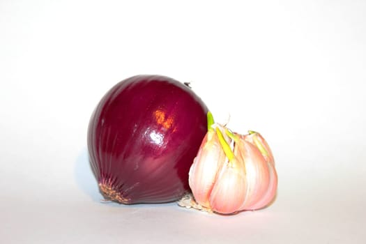 Red onion and garlic on white background