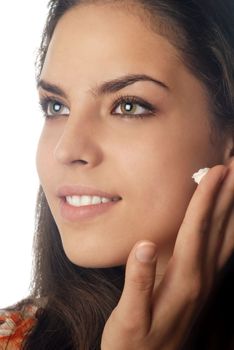 Photo of smiling model with beauty cream
