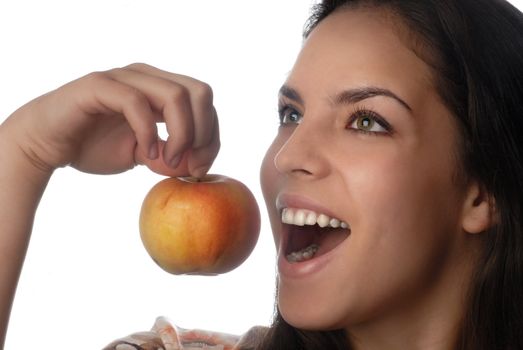 Photo of smiling model with good teeth and pure apple