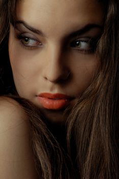 Sexy fashionable model with green eyes and red lips