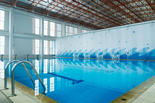 Indoor swimming pool and stainless steel staircase