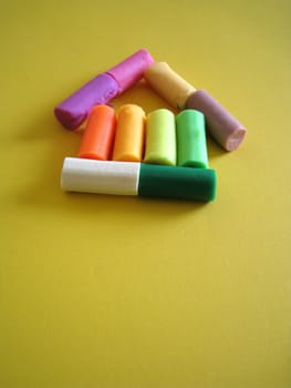 house shape arrange by multi color clay 
