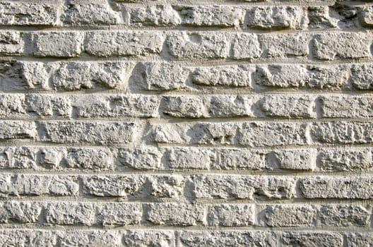 Background ancient brick wall sunlight sun. Architectural closeup backdrop.