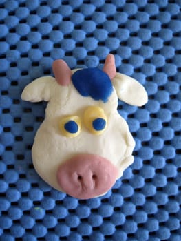 a cow head made by soft clay