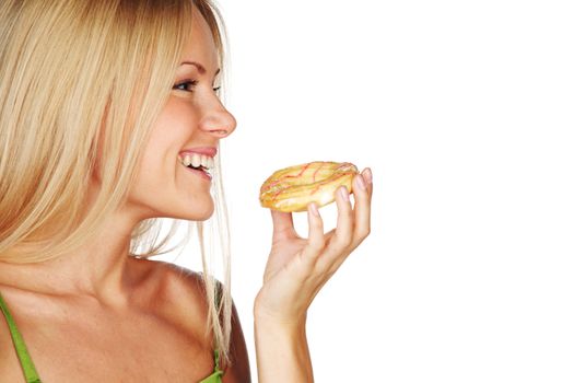 woman eating a cake on a white background