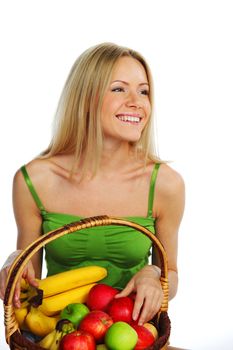 woman holds a basket of fruit on a white background