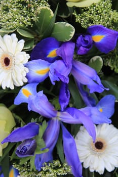 Blue and white flower arrangement with iris and gerbera