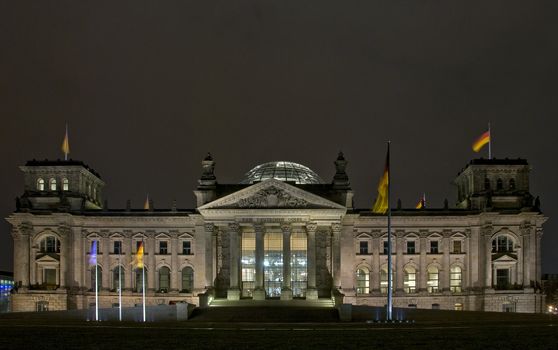 The Reichstag building at night in Berlin, Germany