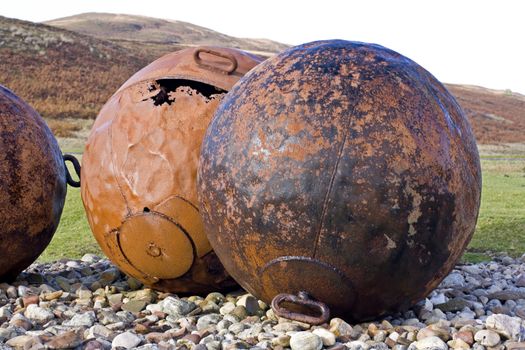 big balls at scottish coast. old buoys