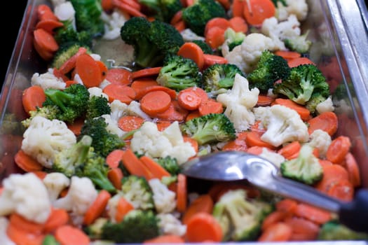 Mixed vegetables in pan with carrots and broccoli