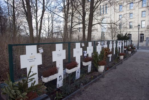grave crosses near the brandenburger tor Berlin from people try to escape east berlin during war