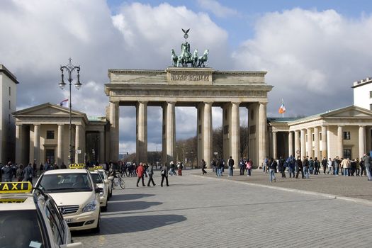 people walking at the brandenburger tor in Berlin