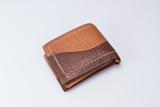 Brown Leather Wallet on white surface folded view