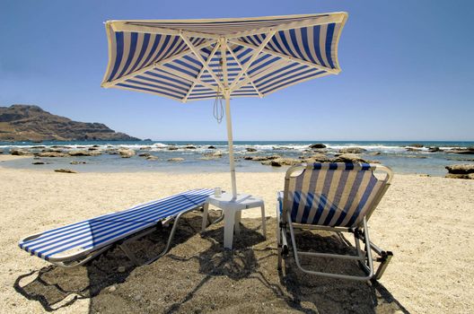 umbrella and sun loungers