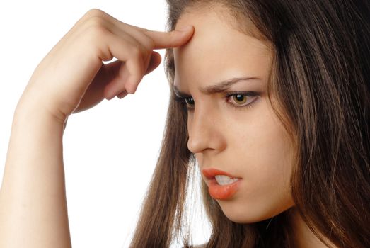 Young thinking woman making a decision with finger at her forehead