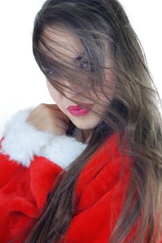 Sexy woman with long hair in Santa costume