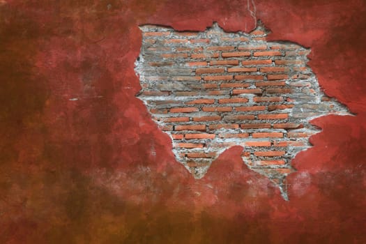 Cracking grunge weathered vintage and fragment of Red brick wall using as background