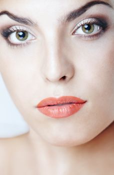 Close-up portrait of the beautiful lady with perfect makeup