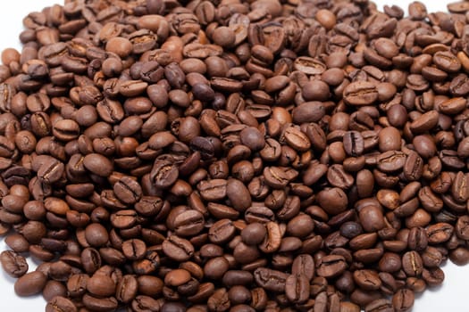 coffee beans close up isolated on white