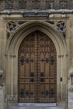 Antique door entrance in  London, Palace of Westminster