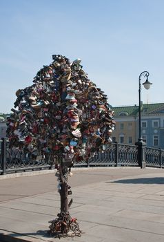 A tree with wedding locks on Luzhkov bridge. Moscow