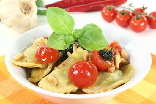 cappelletti with melted tomatoes and roasted pine nuts