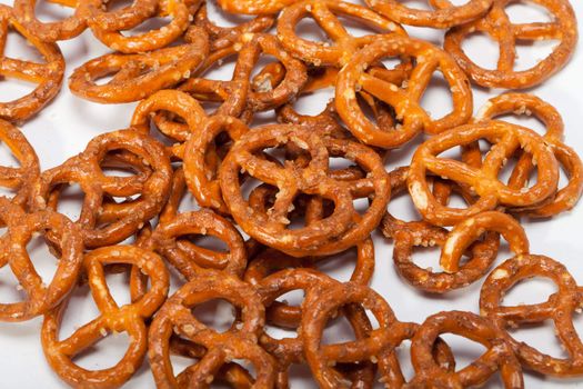 salted pretzels on white background 