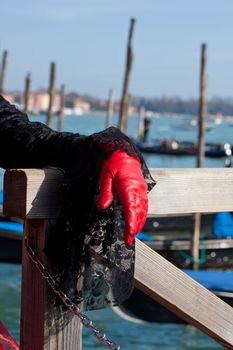 Red glove, Mask in the Venice carnival