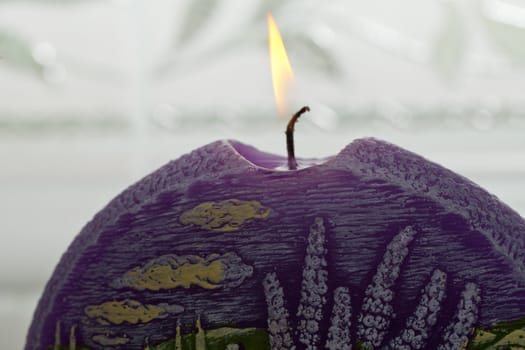 Candle with lavender flowers. Aromatherapy concept 