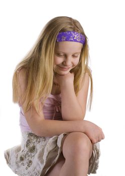 Girl thinking and  contemplating isolated on white background