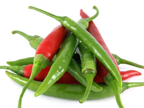 Piled red and green chilies