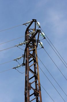 A distribution line over blue sky