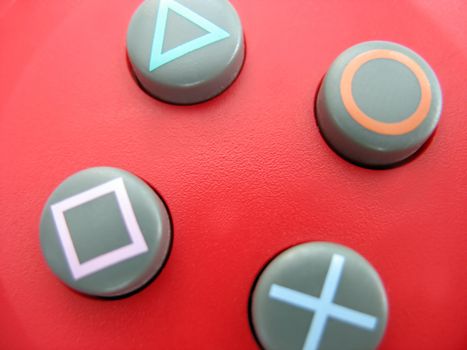 closeup of some gamepad / videogame controller buttons