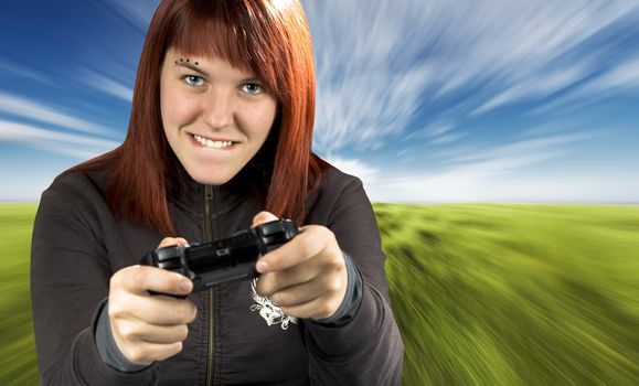 Redhead girl joyfully playing Playstation console.

Shot in studio, processed in PS with a composite background.