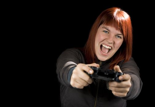 Girl using the sixaxis game controller and playing video games on her Playstation.