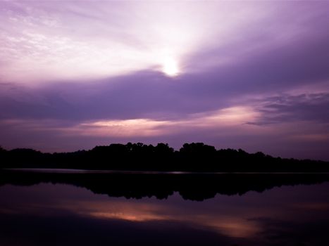 Purple sky over the waters, shot taking during sunset