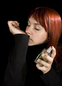 Girl using parfume