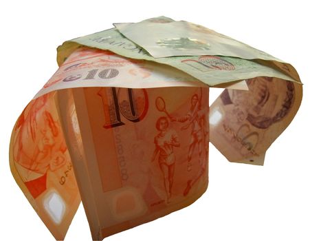 Singapore dollars stacked on each other with a white background