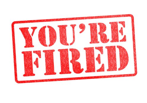 YOU'RE FIRED Rubber Stamp over a white background.