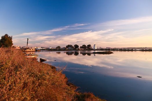 Sunset on the Tejo river with Barreiro mills in background.