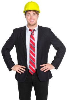 Engineer or architect man in suit wearing helmet isolated on white background. Young male professional smiling happy and confident