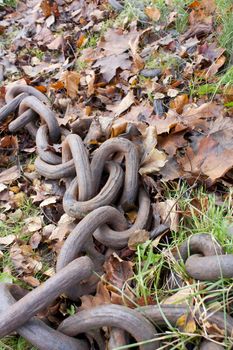 Photo of old rusted marine anchor chain.