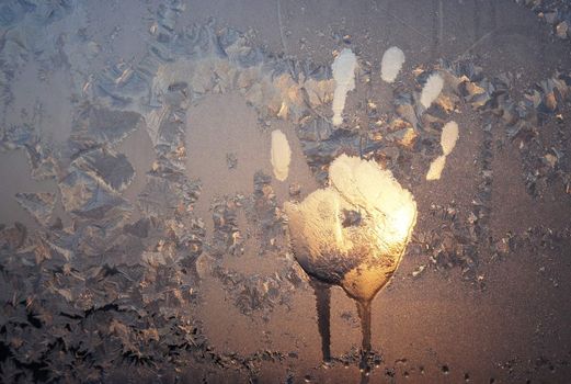Handprint on ice window, sign desires spring