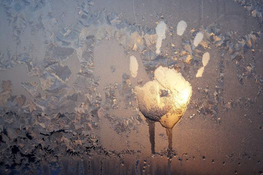 Handprint on ice window, sign desires spring