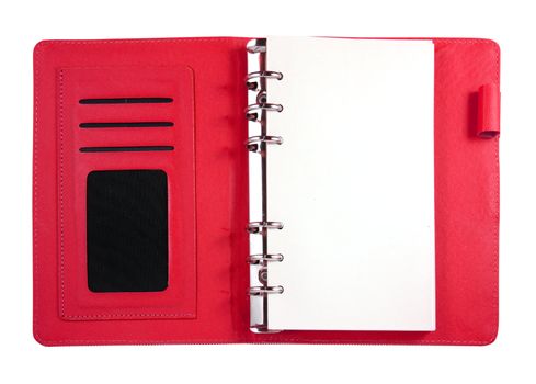 Red canvas binder notebook with blank card and pencil isolated on white 