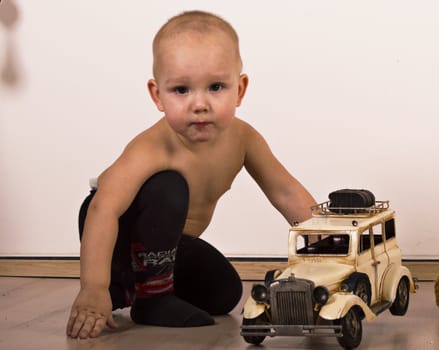 boy with toy car