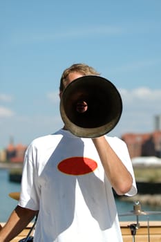 A man is holding a megaphone