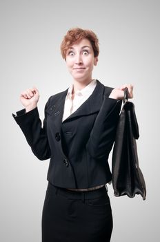 happy business woman with briefcase on gray background