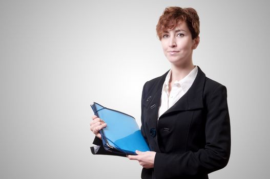 success business woman with briefcase on gray background